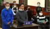 Các bị cáo tại phiên tòa sơ thẩm, Nguyễn Thanh Khoa áo xanh, đứng ngoài cùng bên trái.